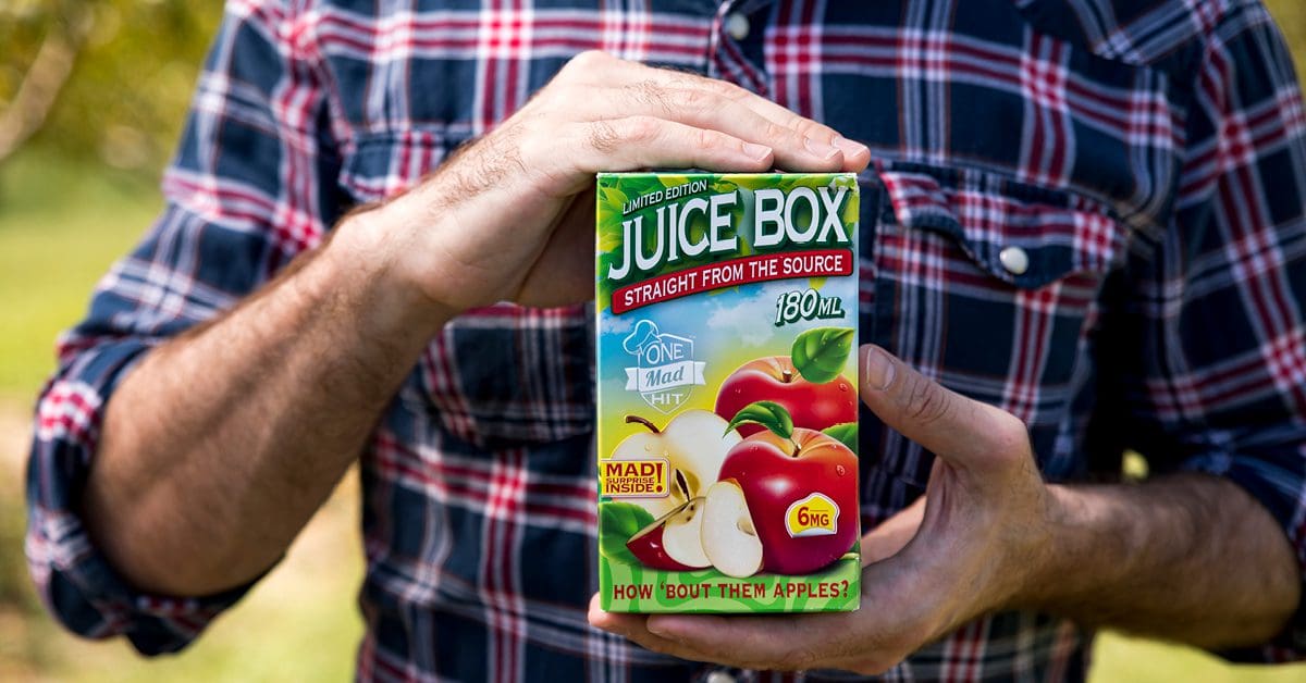 Farmer holding juice box