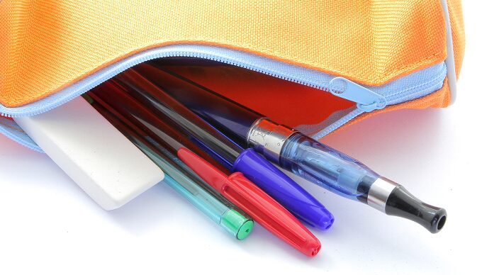 Vape pen hidden in page of pencils and eraser